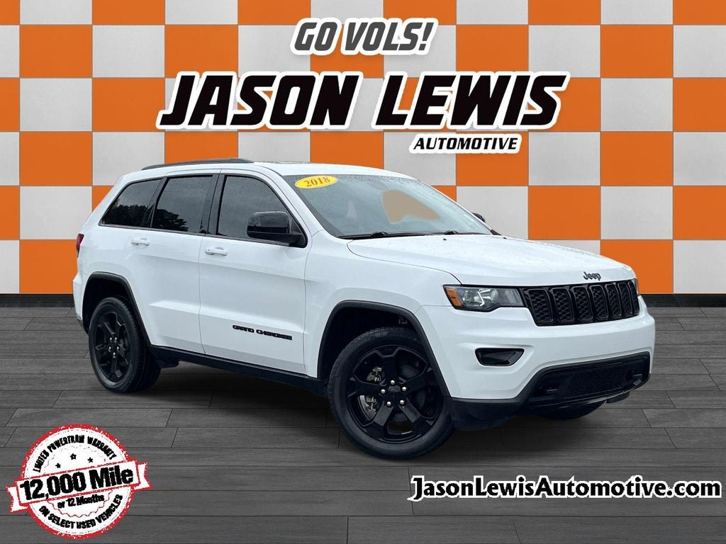 2018 Jeep Grand Cherokee Laredo in Bright White Clearcoat — front three-quarter view