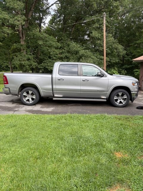 2020 RAM 1500 Laramie in Billet Silver Metallic — front three-quarter view