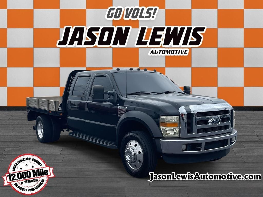 2008 Ford F-550SD Lariat DRW in Black Clearcoat — front three-quarter view