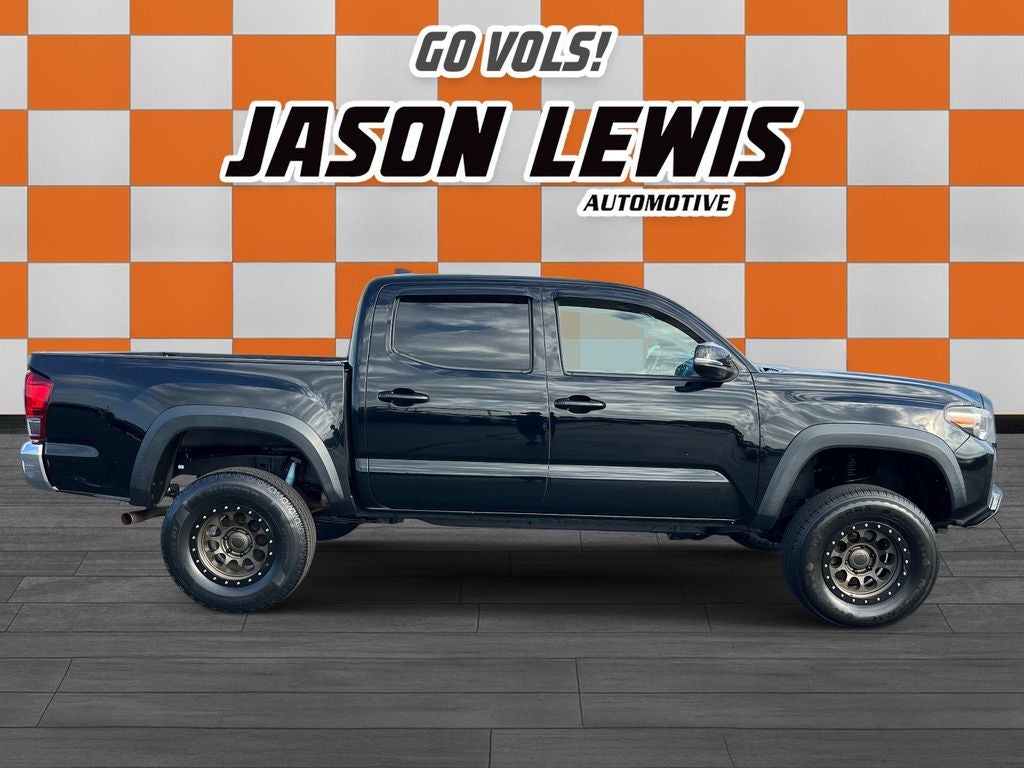 2016 Toyota Tacoma — side profile view